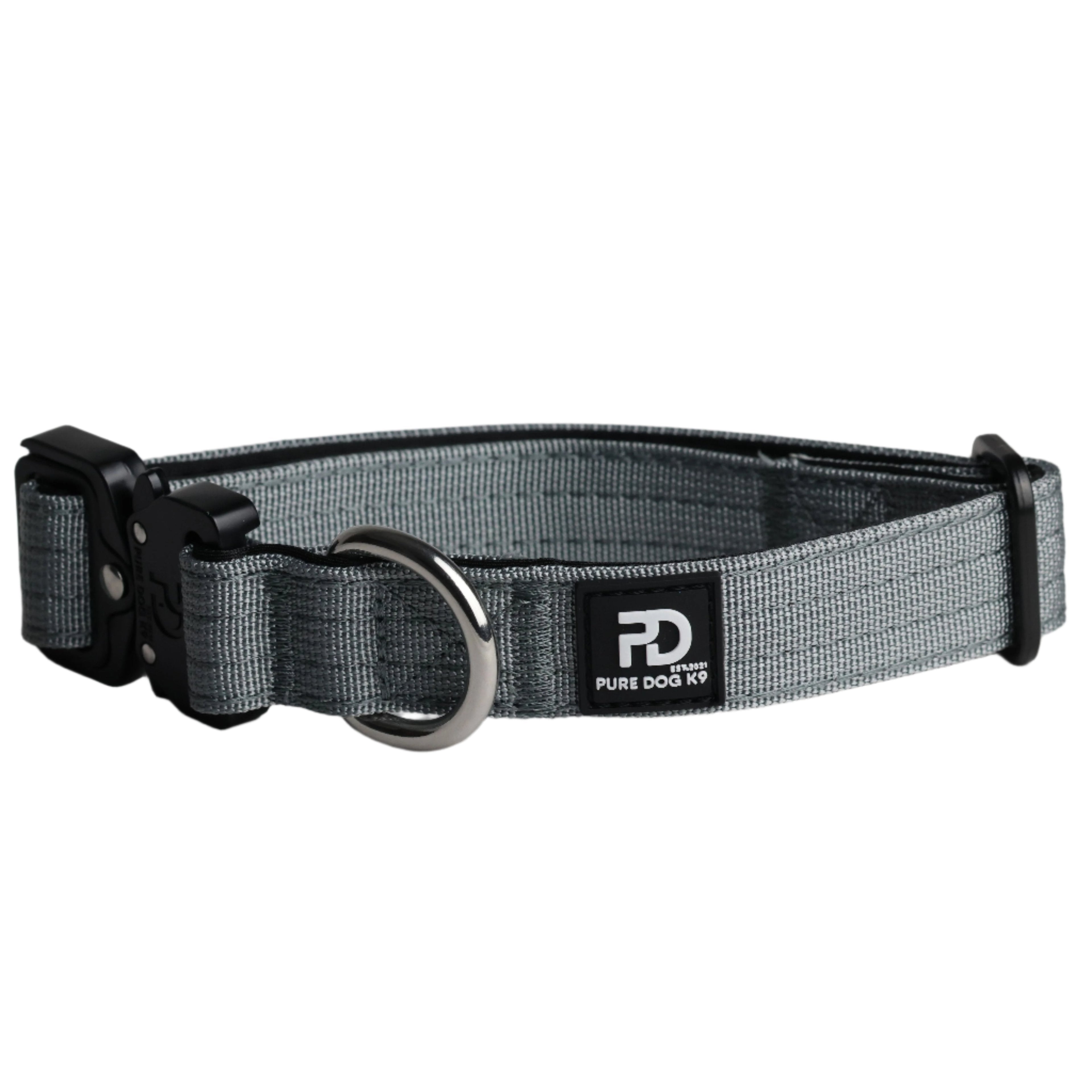 Grey tactical dog collar with black clasp, metal ring, and brand logo patch