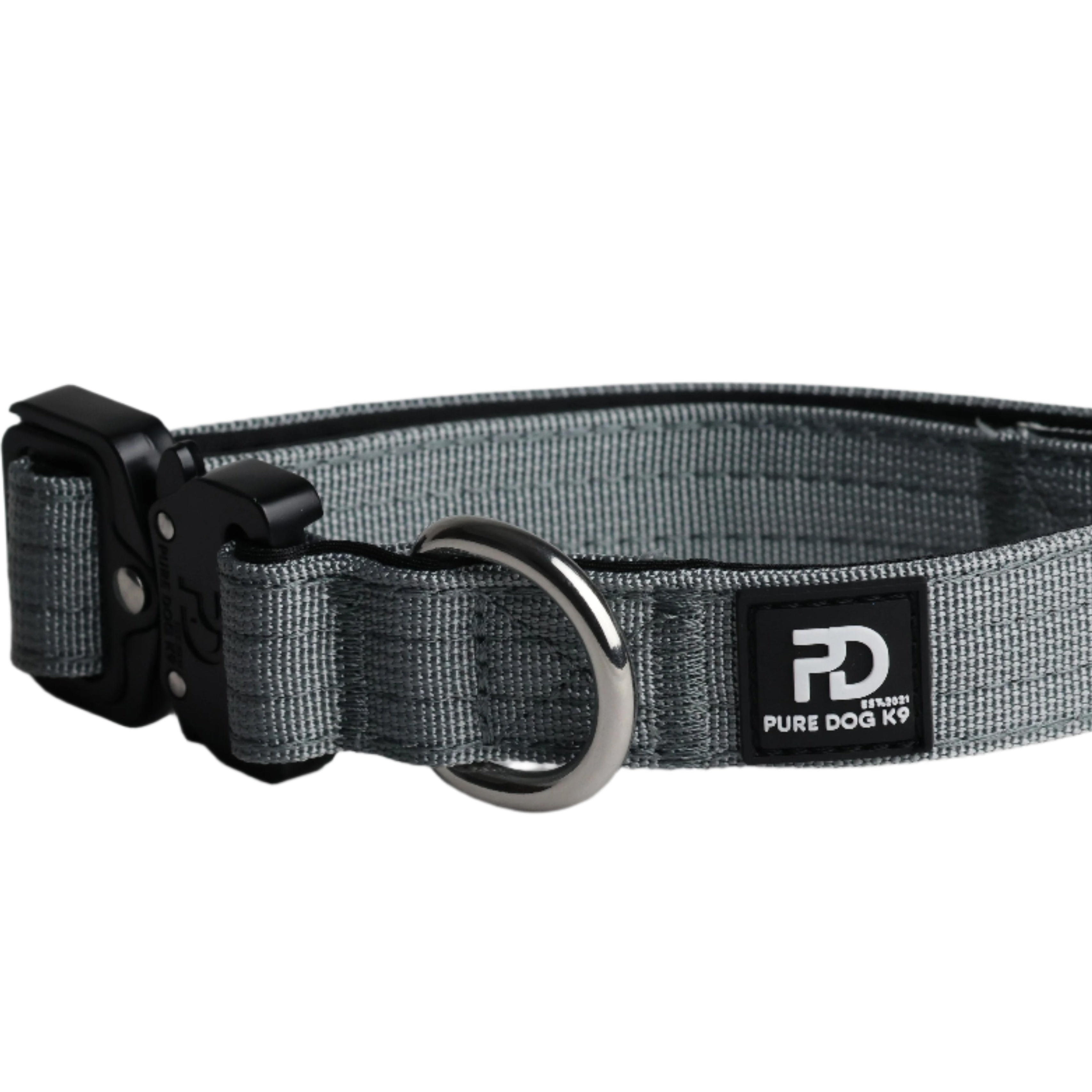 Grey tactical dog collar with black buckle, metal D-ring, and logo patch