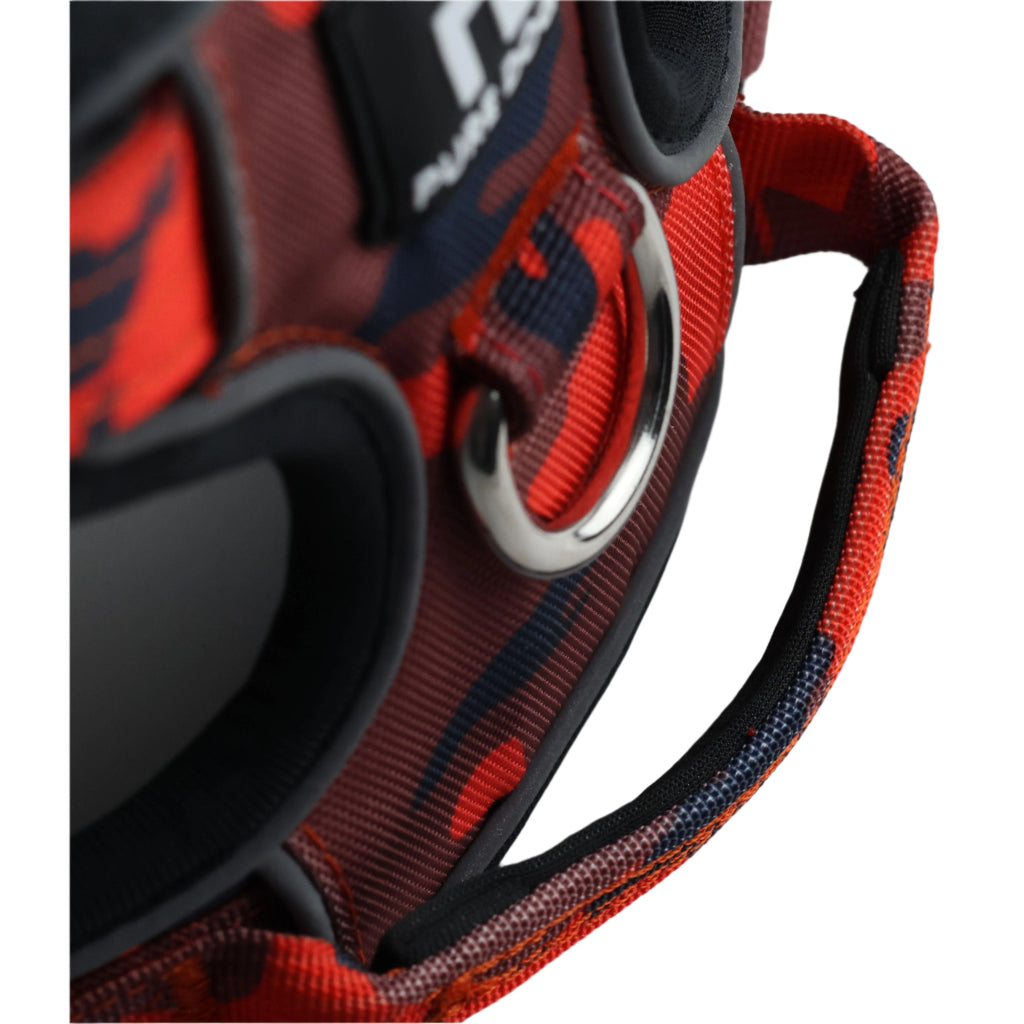 Red and navy camo dog harness close-up with metal D-ring and padded strap