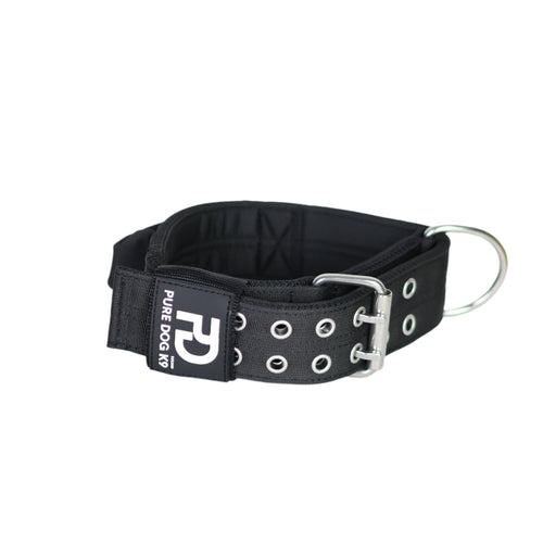 Black sport dog collar with metal D-ring, padded lining, and silver grommets