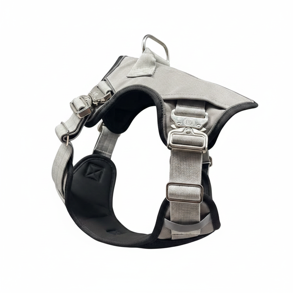 Light gray no-pull dog harness with padded belly panel and adjustable side straps
