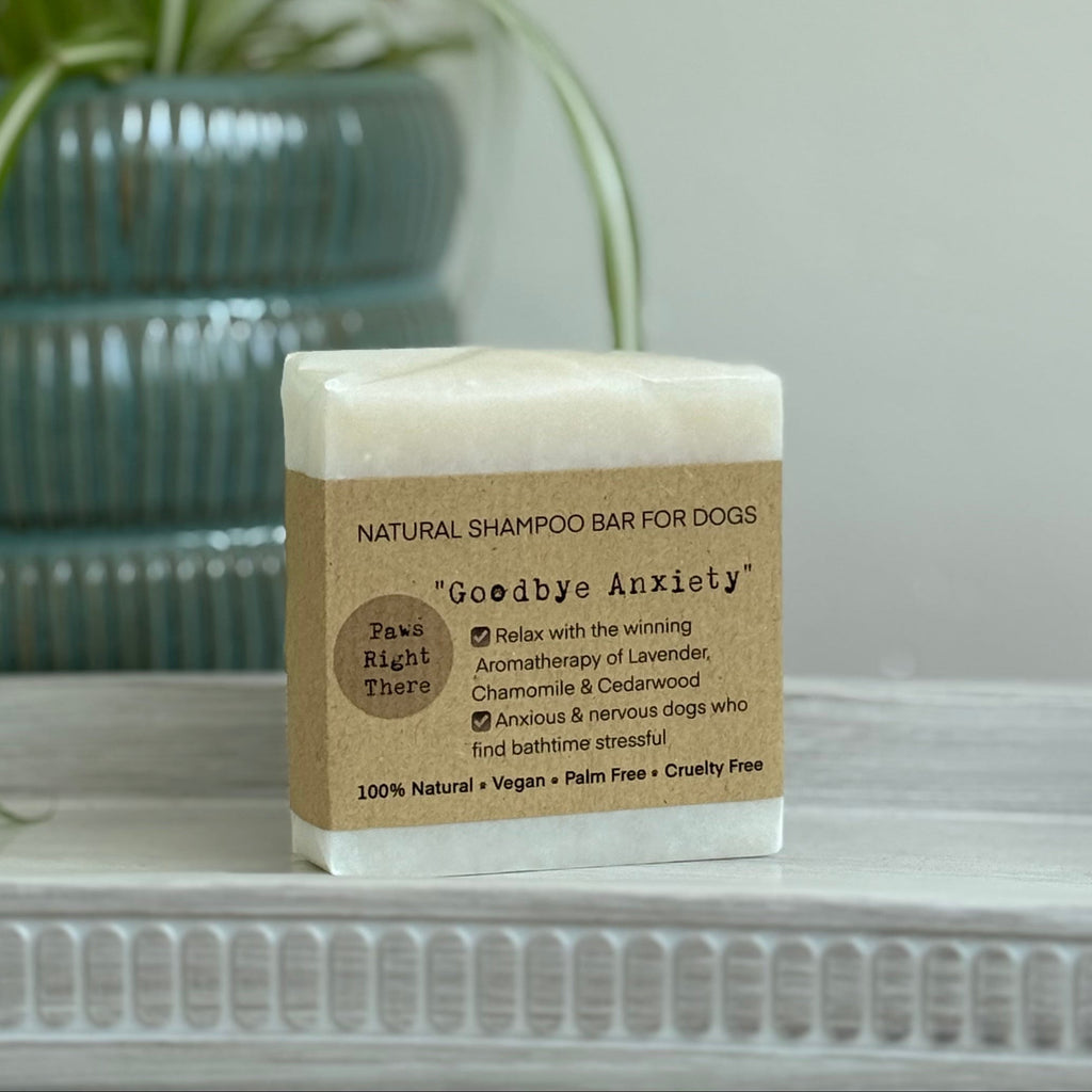 White natural dog shampoo bar with tan label “Goodbye Anxiety”