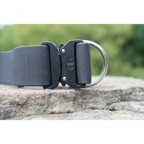 Dark navy waterproof dog collar with raised texture and metal D-ring