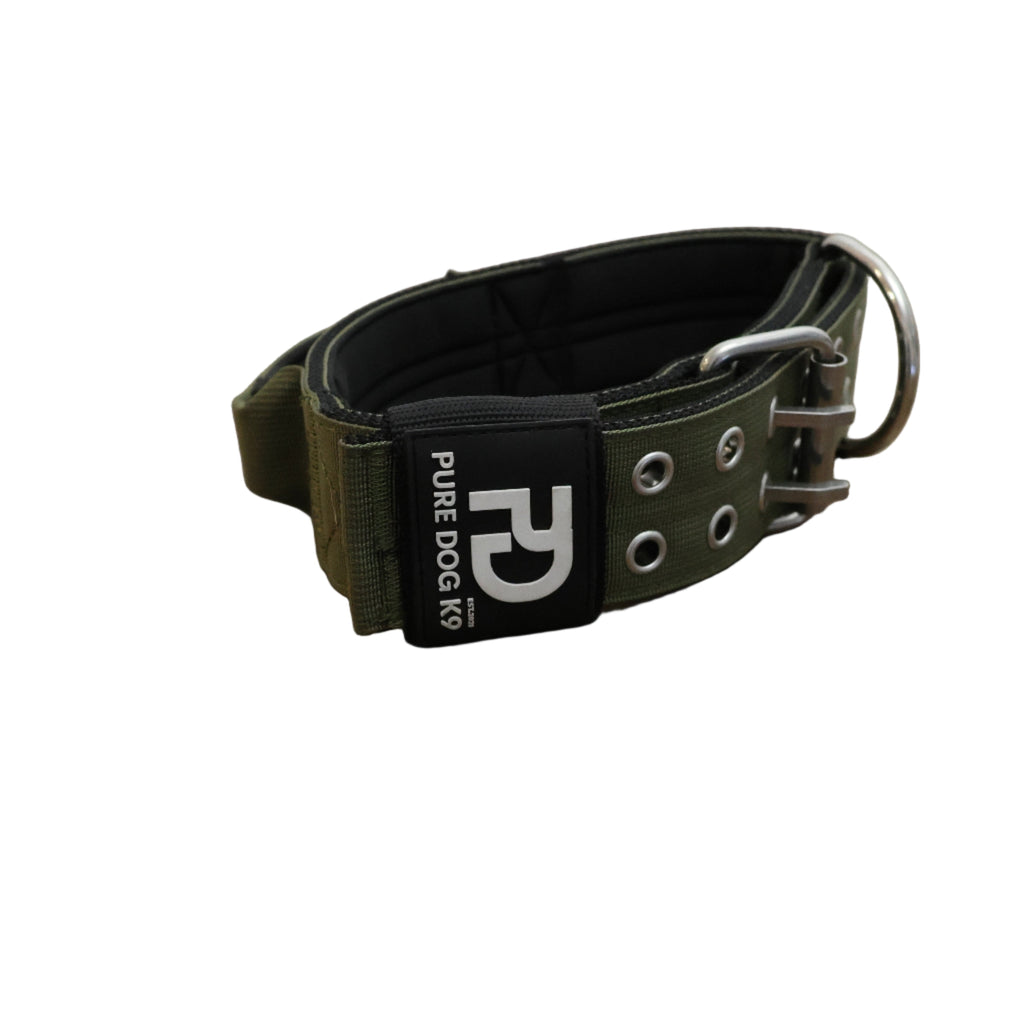 Khaki sport dog collar with metal D-ring, prong buckle, and black logo patch