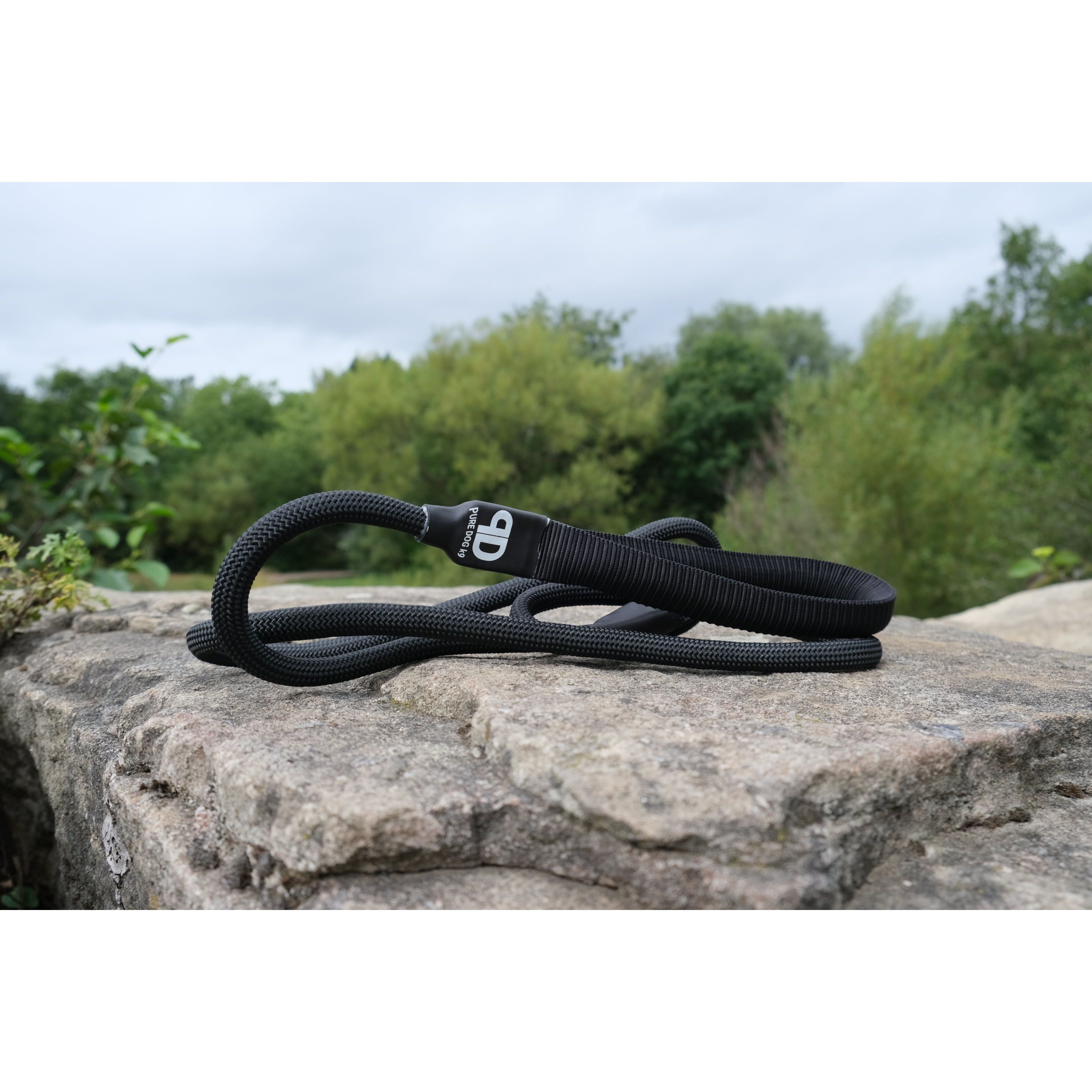 Nylon slip lead with rubber stopper, dark color, coiled