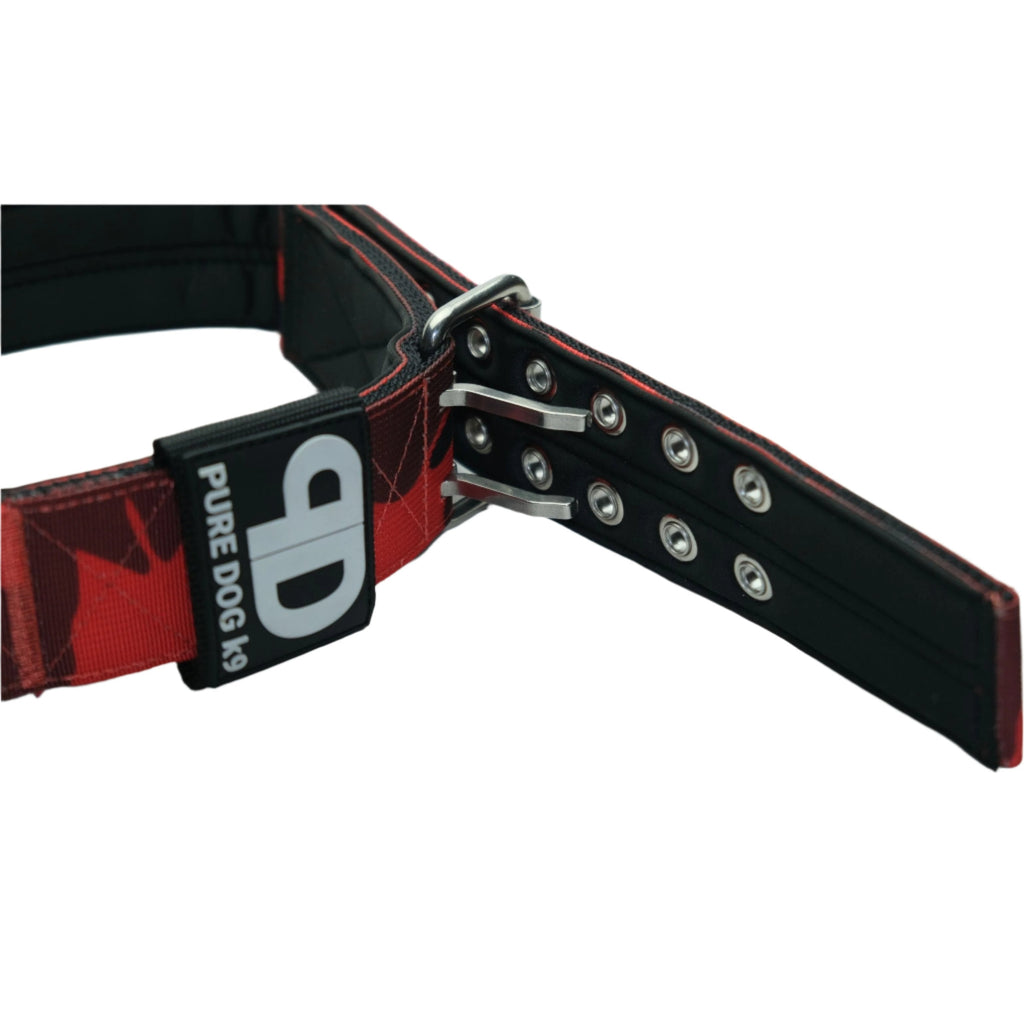 Red camo dog collar with metal leash hardware and label tag at the side