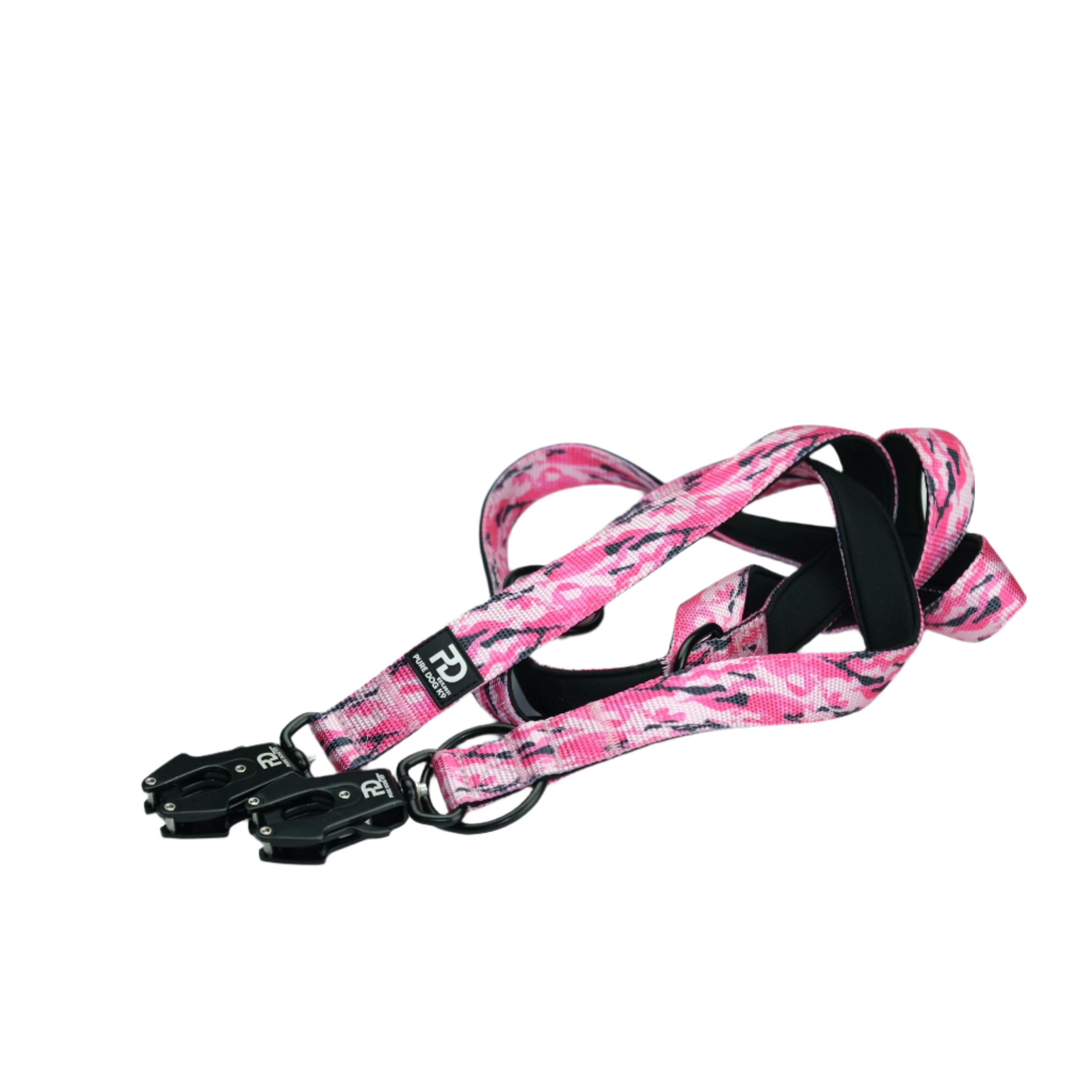 Multifunctional dog leash in pink camo with black metal clips and adjustable strap