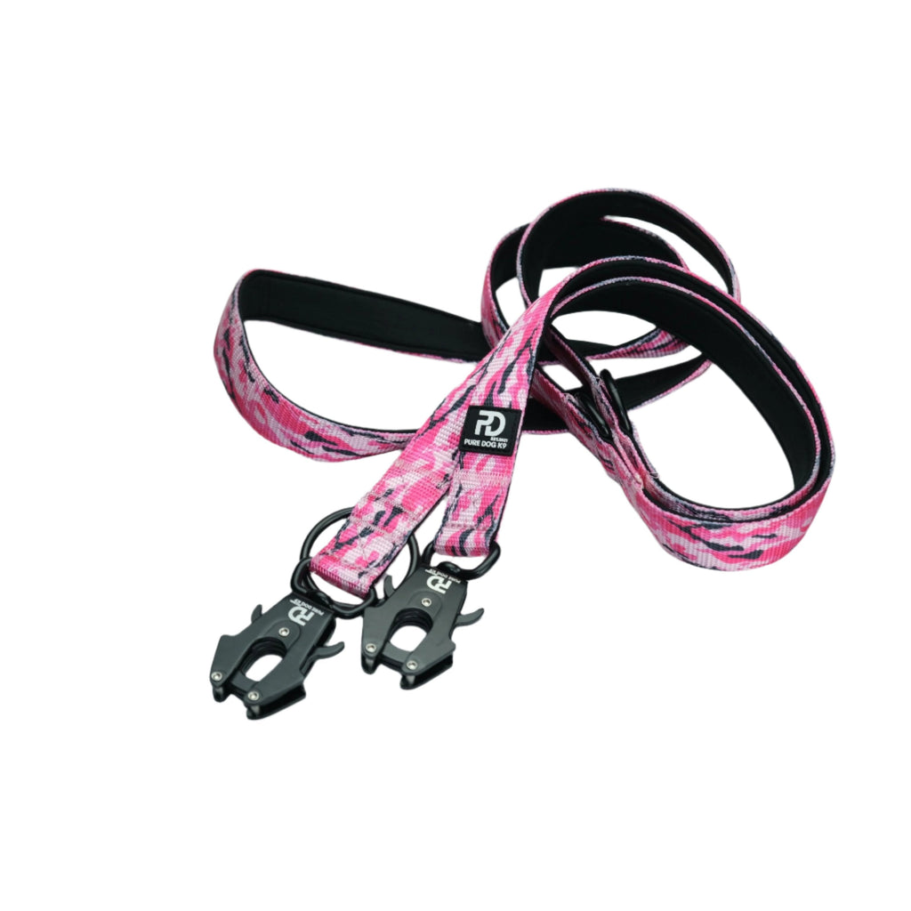 Multifunctional dog leash pink camo with black harness clips and looped strap