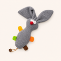 Gray plush rabbit-cat toy with long ears, red nose, white eyes, and brown paw pads.