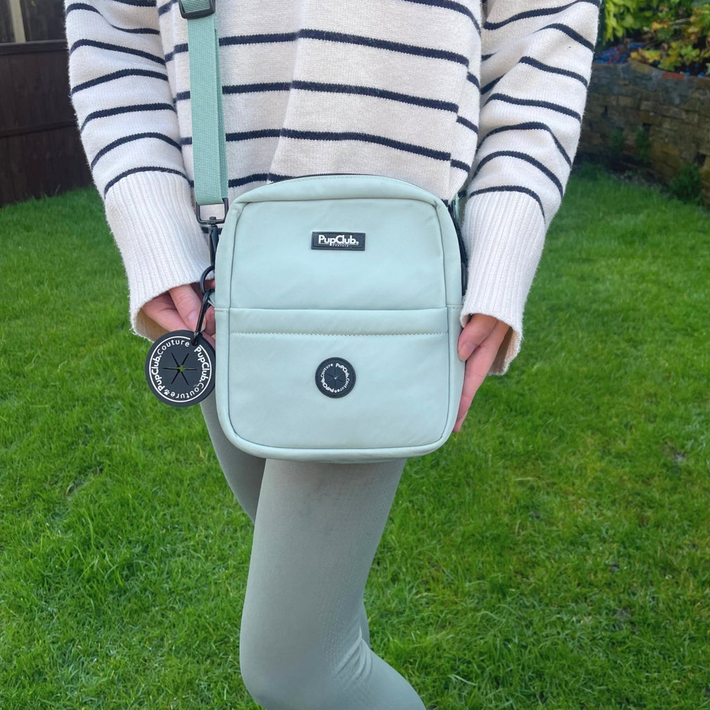 Mini dog walking bag, sage green with front zipper pocket and logo patch