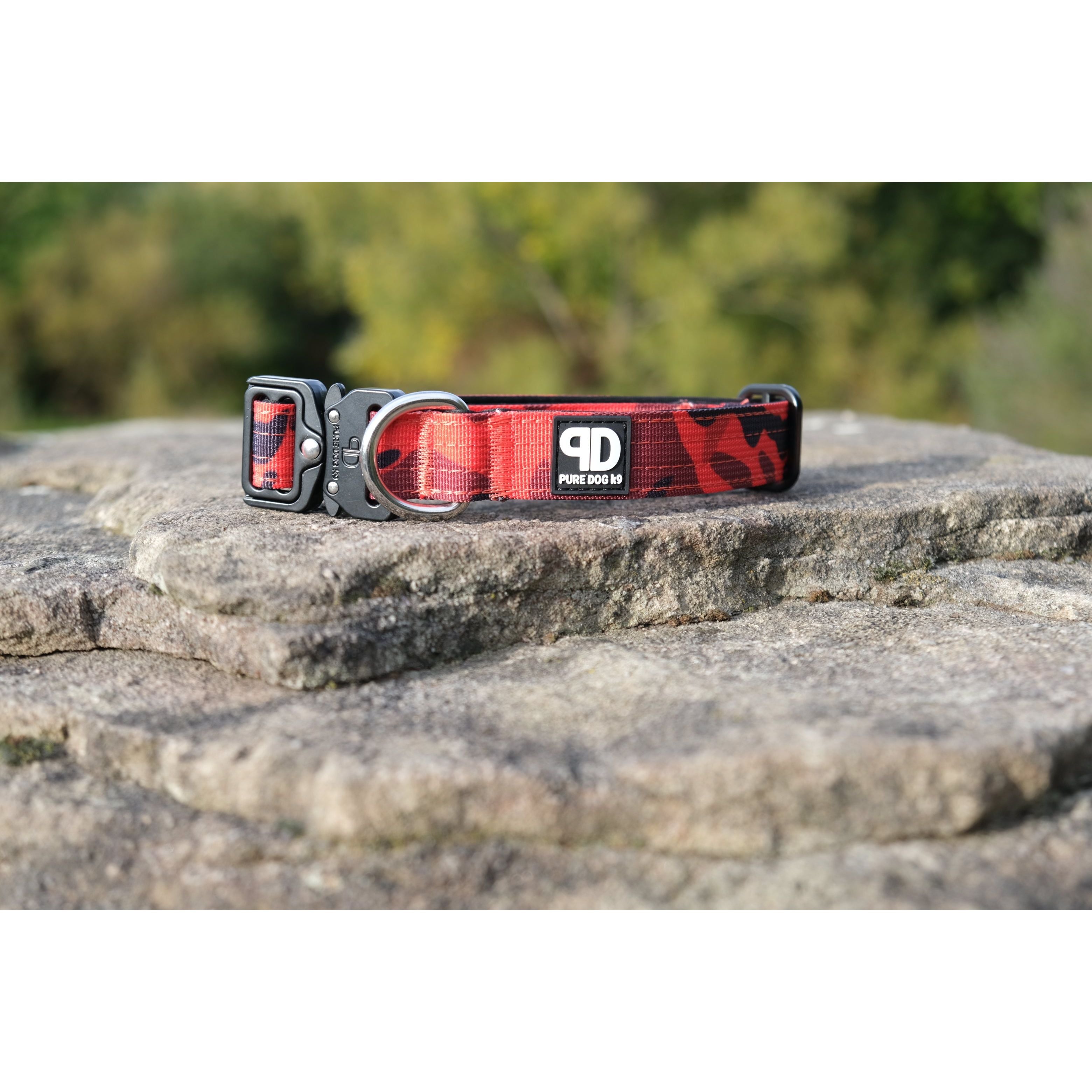 Tactical dog collar in red camo nylon with black clasp and metal D-ring