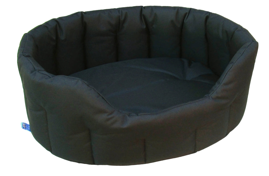 Oval high-sided waterproof dog bed in dark green, quilted padded sides with bolstered rim.
