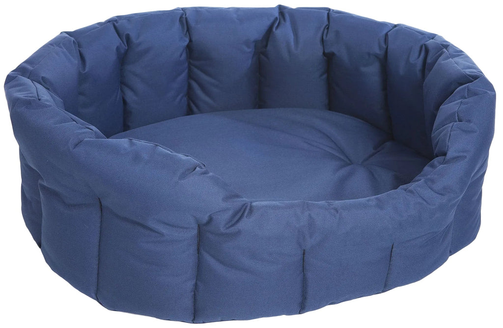 Oval high-sided waterproof dog bed in blue, quilted padded sides with bolstered rim.