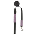 Dog lead with purple padded handle, black dotted webbing, and metal clasp.
