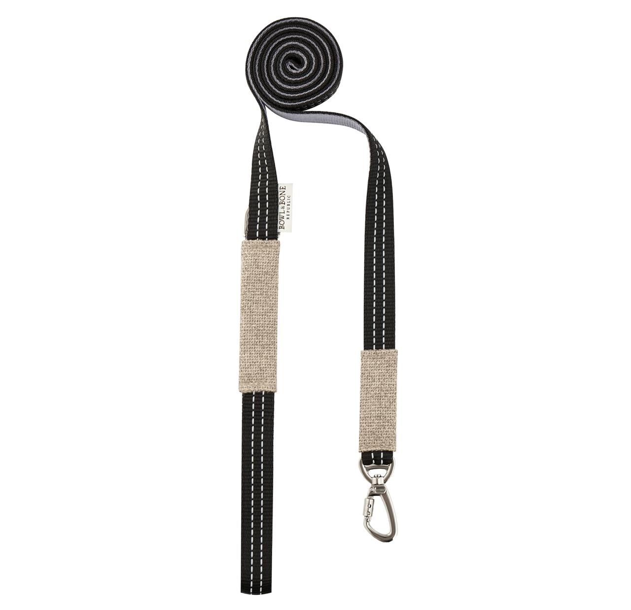 Cream and black dog lead with metal swivel clip and dotted webbing