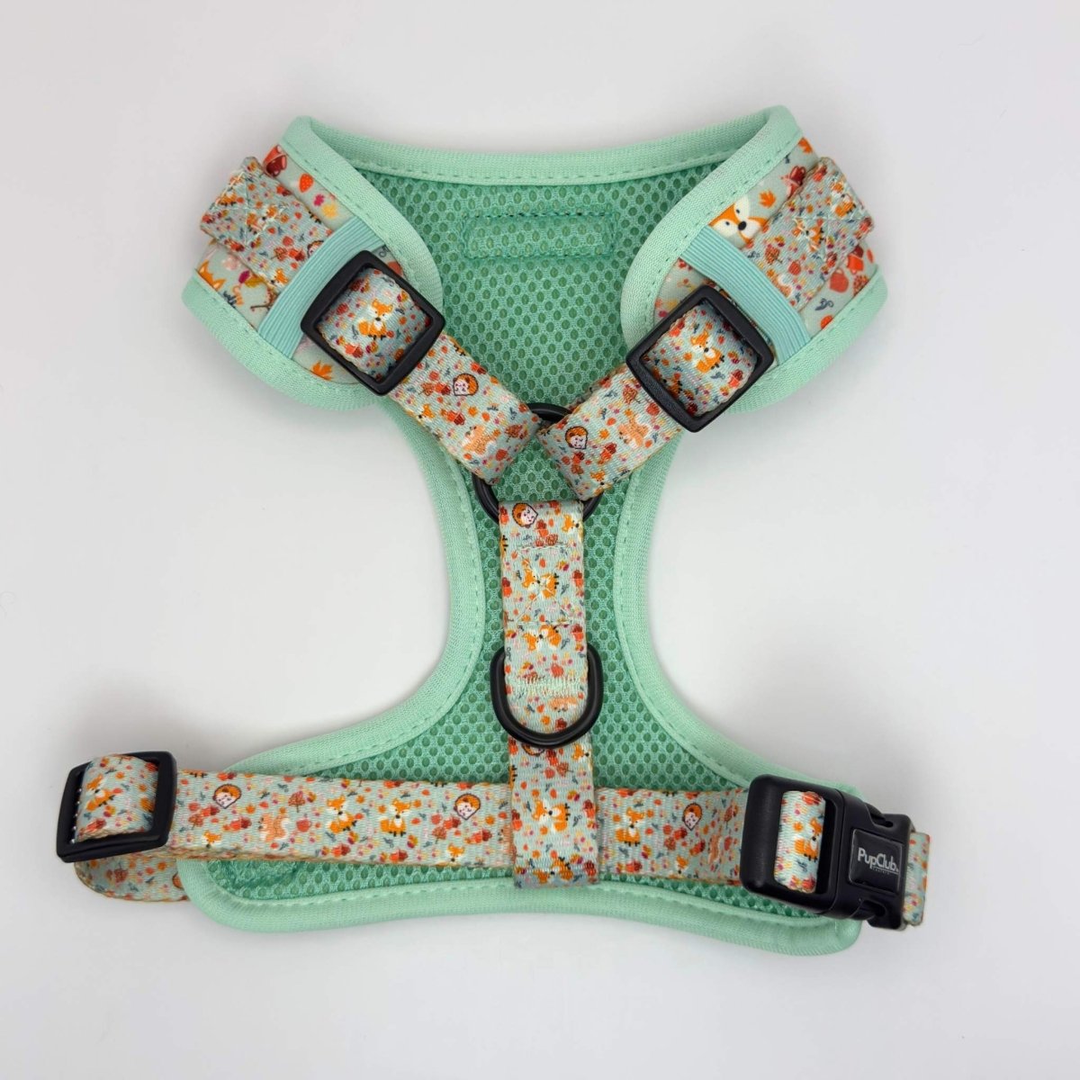 Adjustable dog harness with woodland print, mint trim, front buckles and straps