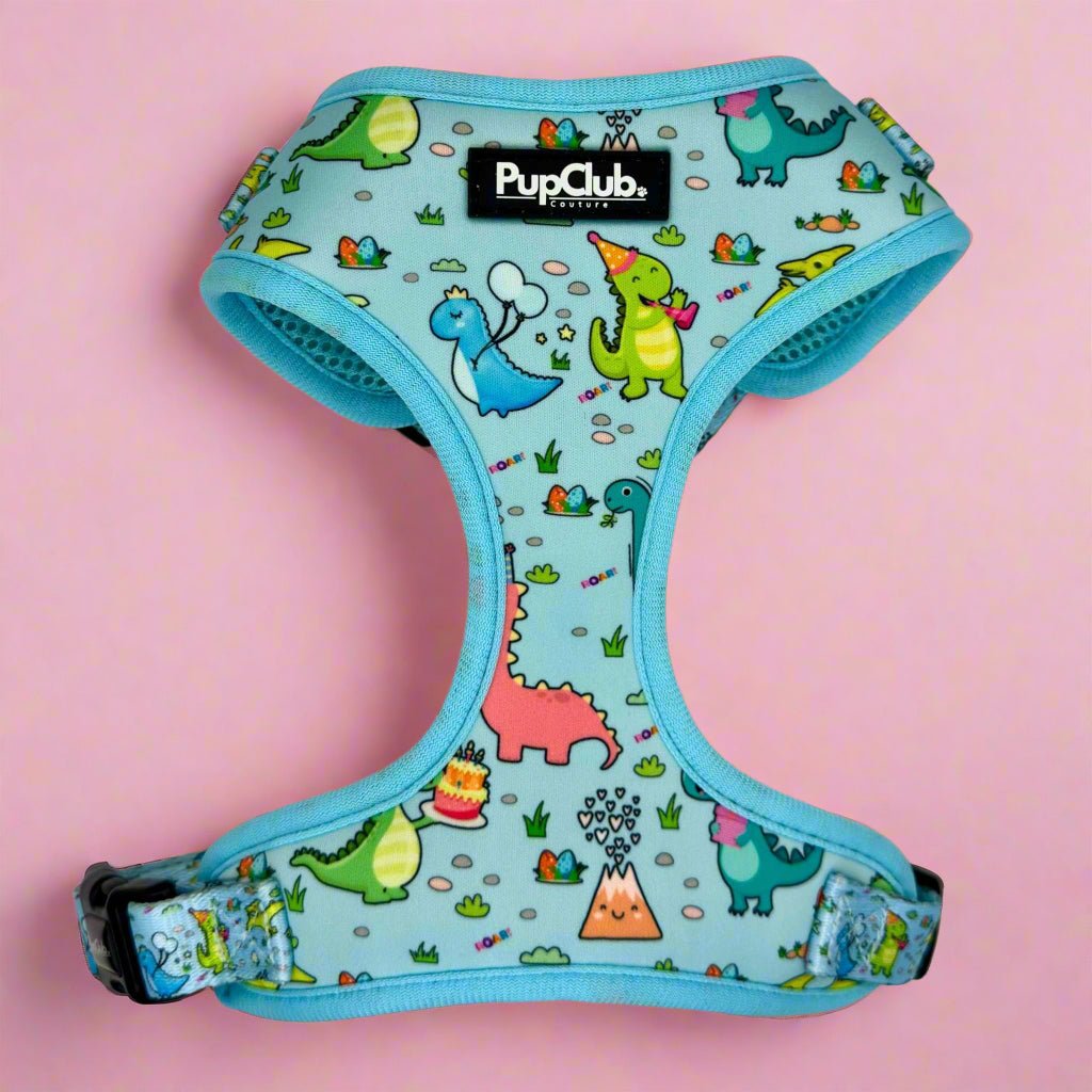 Adjustable dog harness in light turquoise with dinosaur graphic print, front strap