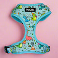 Adjustable dog harness in light turquoise with dinosaur graphic print, front strap