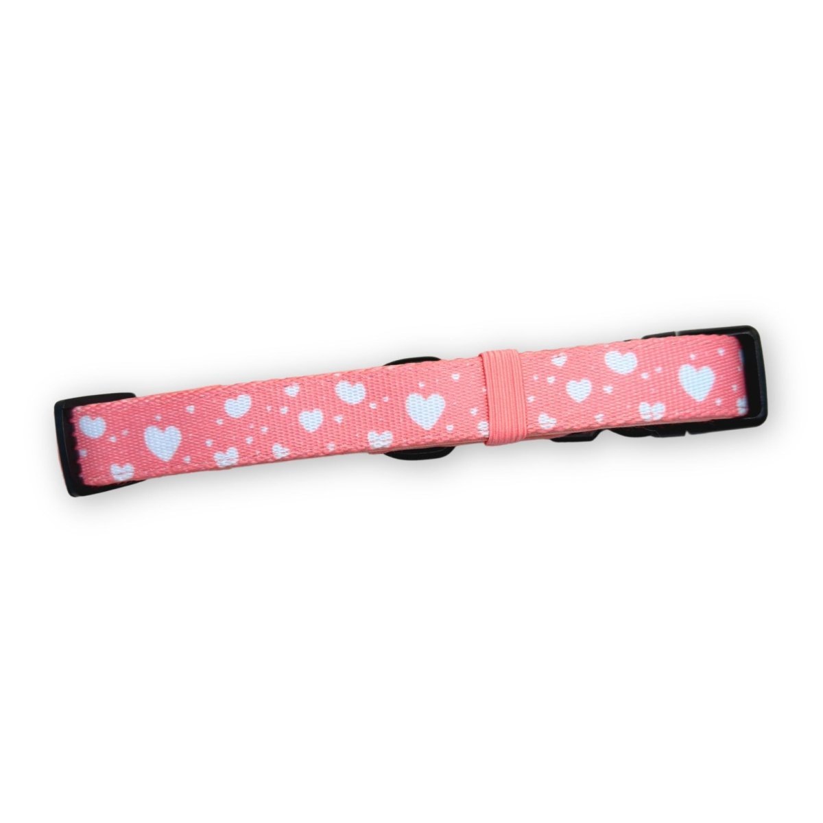 Peachy pink dog collar with white hearts, black buckle, PupClub label strip