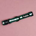 Forest green dog collar with white stripe and PupClub logo, metal buckle and D-ring