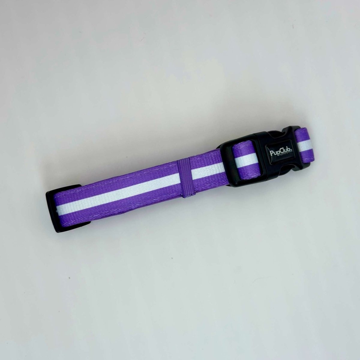 Lilac purple dog collar with white stripe pattern, black buckle and adjuster