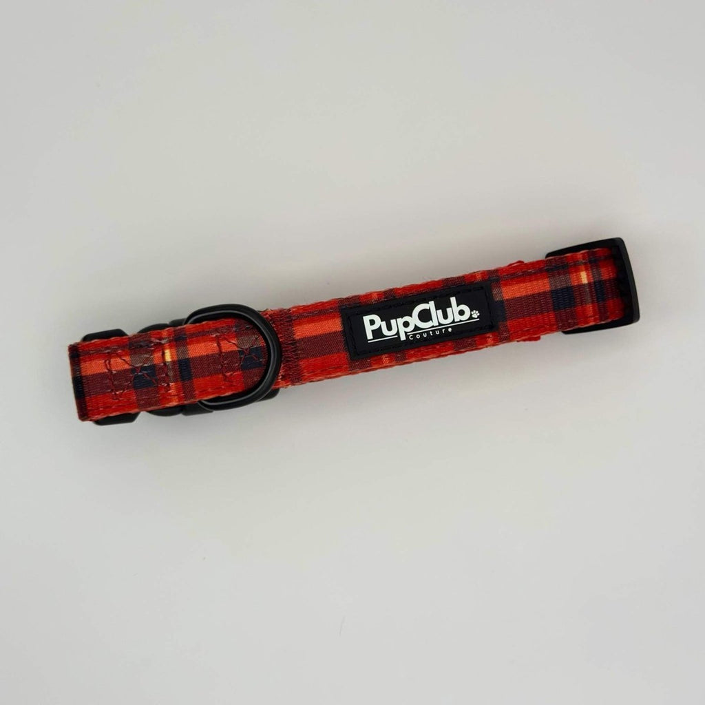 Red tartan dog collar with black buckle and PupClub logo