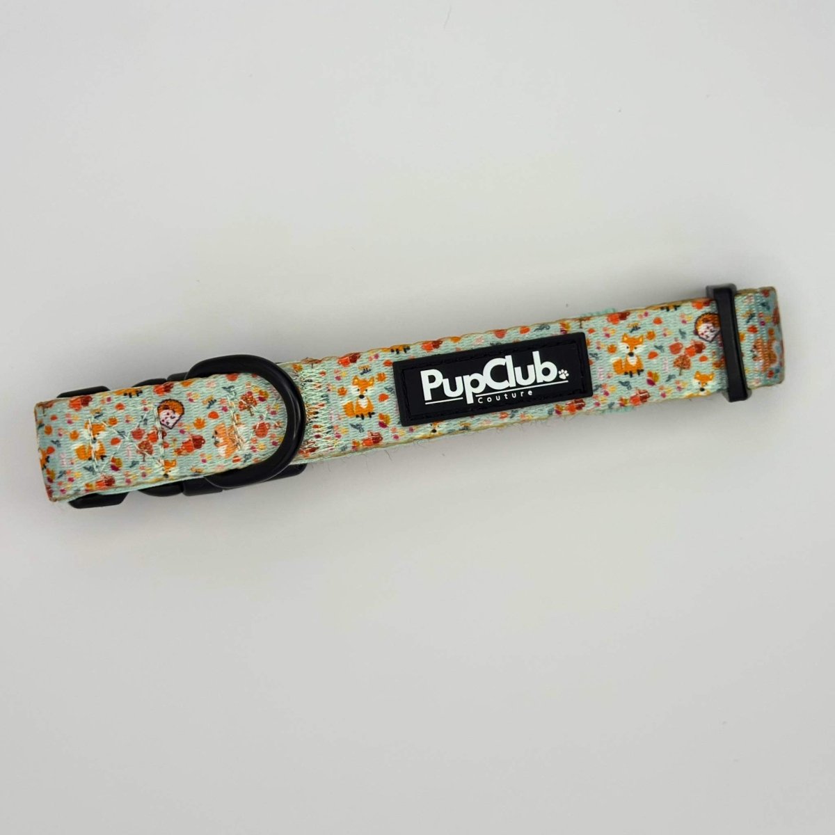 Dog collar with woodland friends pattern, black buckle and PuppClub logo