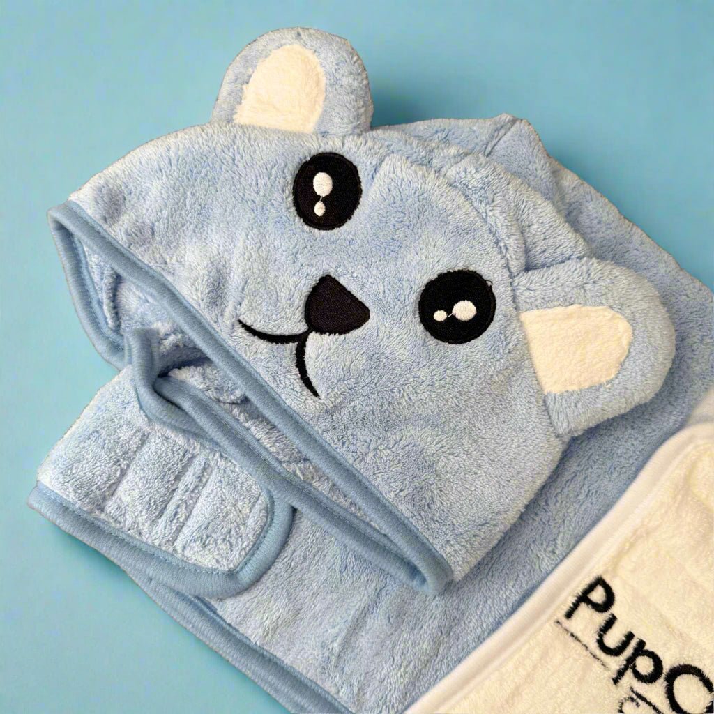 Blue pet drying robe with teddy-face hood and front towel pouch