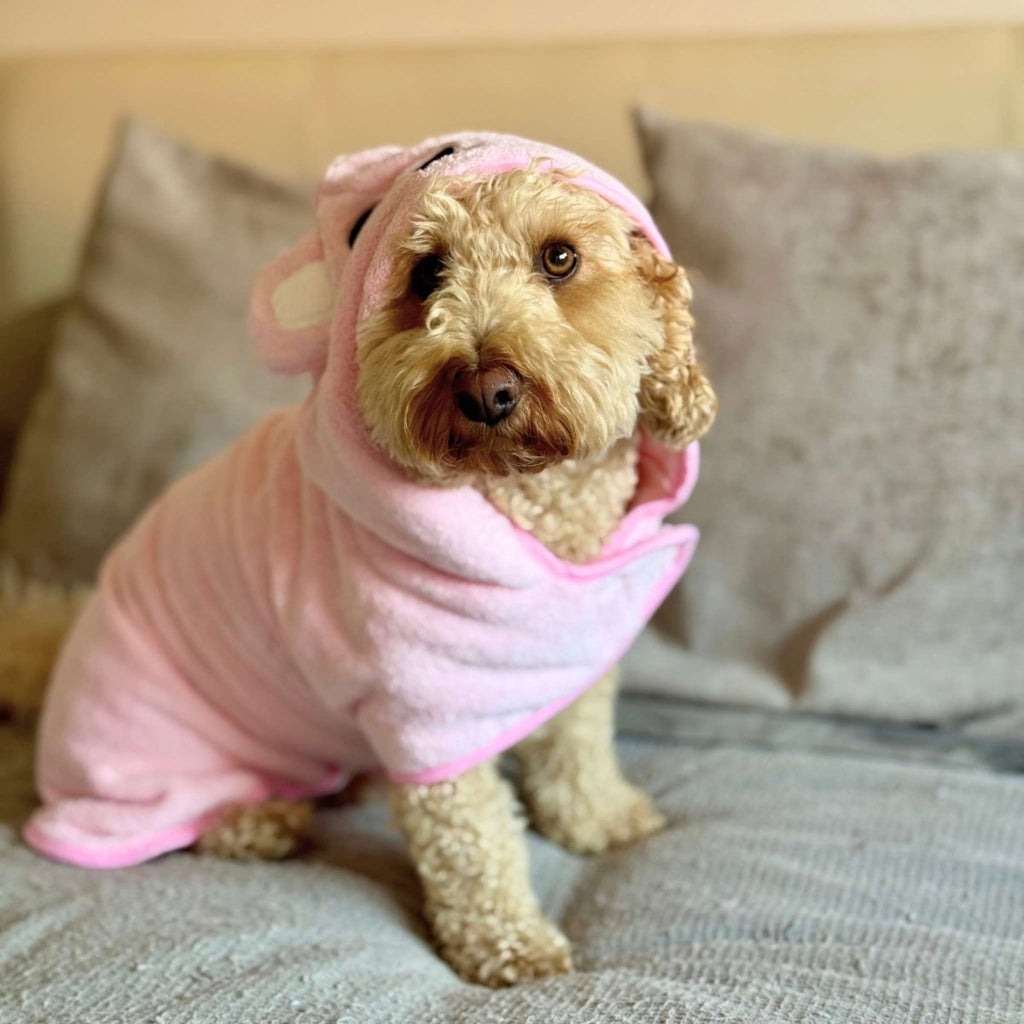 Pink hooded drying robe with PupClub logo patch on the front pocket area