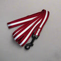 Berry red and white striped ribbon with black clips