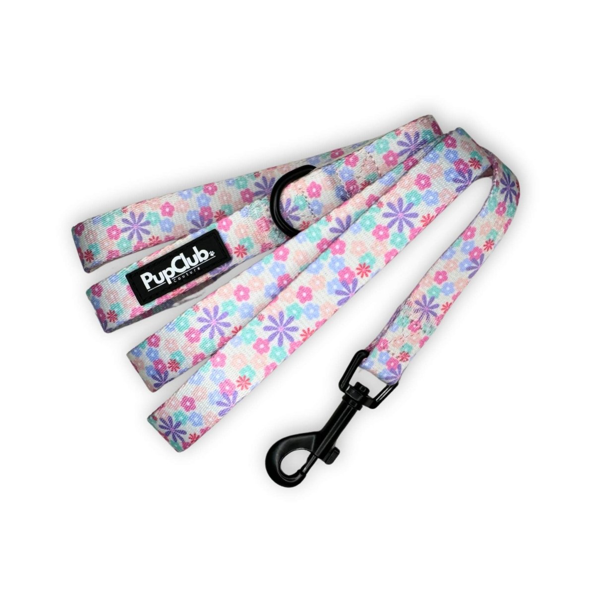Floral dog lead with black D-ring and clasp, pink-and-blue petal pattern strap