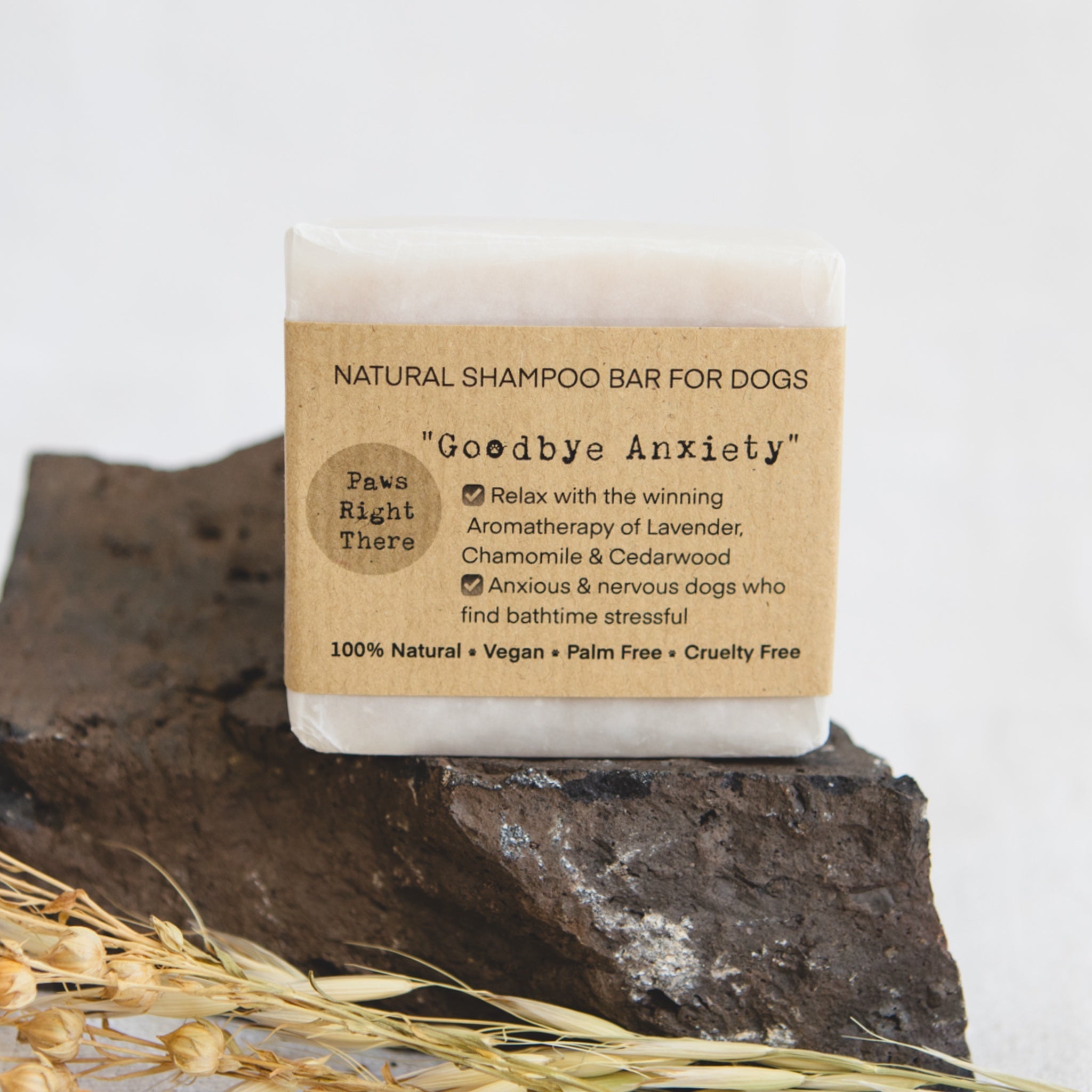 Natural dog shampoo bar with tan label reading “Goodbye Anxiety”