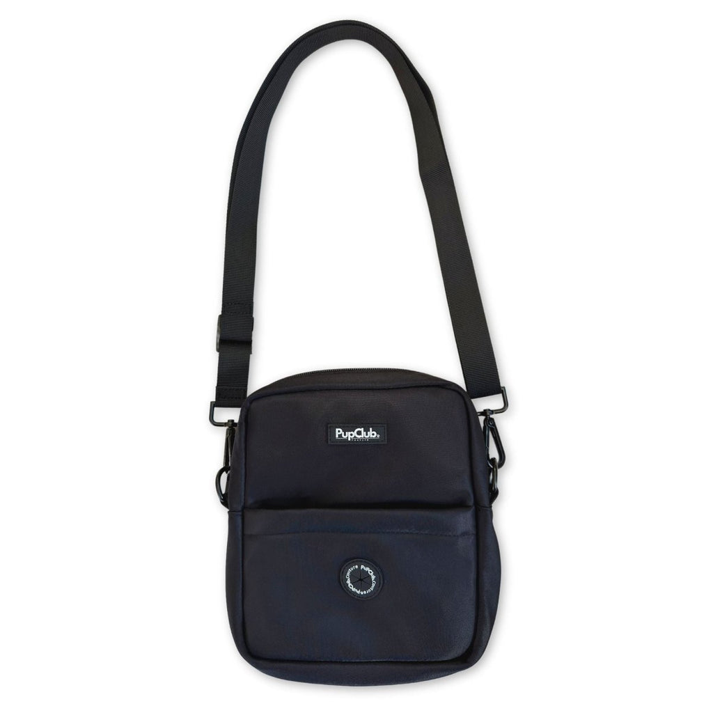 Black mini dog walking bag with curved front pocket and adjustable crossbody strap