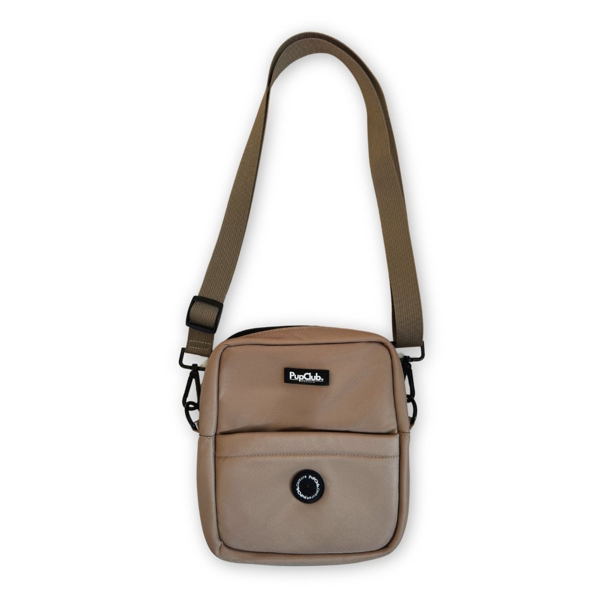 Tan mini crossbody dog bag with PupCub logo, front flap, and adjustable straps