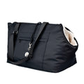 Black pet carrier bag with cream fleece-lined opening and adjustable shoulder strap