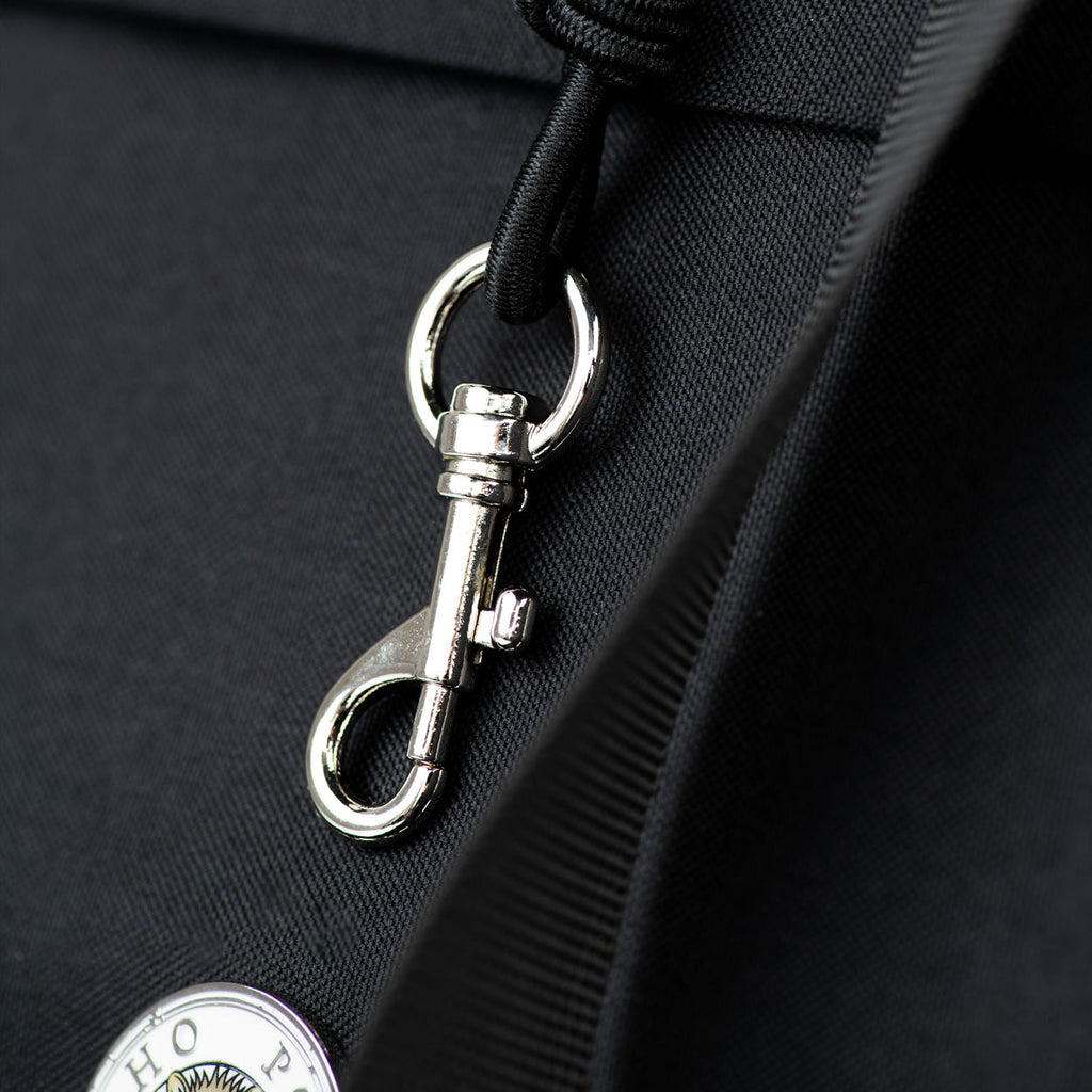 Black pet carrier leash clip and metal D-ring attachment hardware