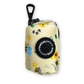 Poo bag holder pouch in cream fabric with bee and flower print, zip top and clip
