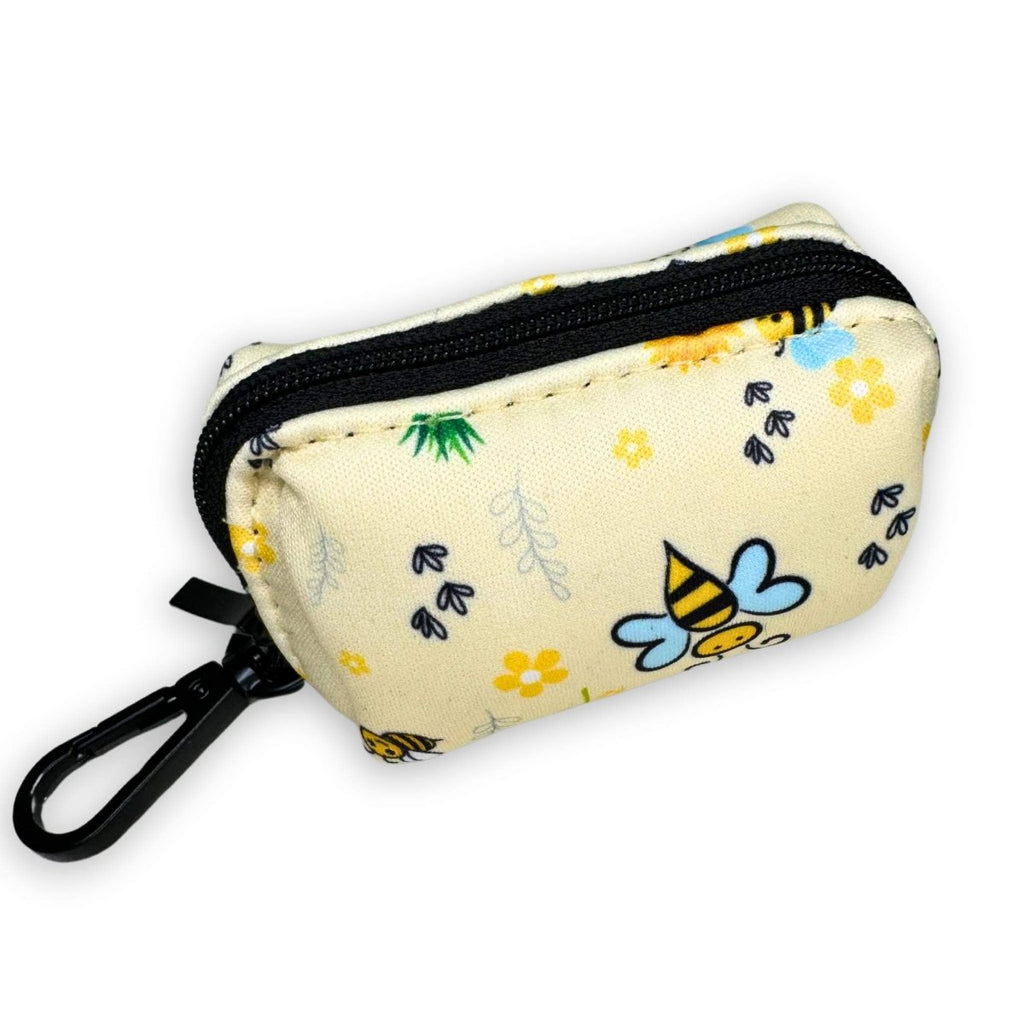 Poo bag holder zip pouch, cream with bee and flower print, black trim and carabiner clip
