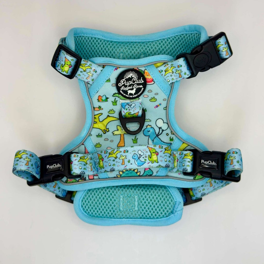 Blue dinosaur-print dog harness with mesh underside and black side buckles
