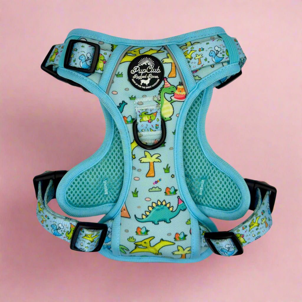 Blue Jurassic dinosaur-print dog harness with front support and black buckles