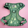 Green evergreen trails dog harness with tree pattern, front view with buckles