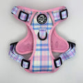 Pink tartan dog harness with black buckles, mesh belly panel, front D-ring