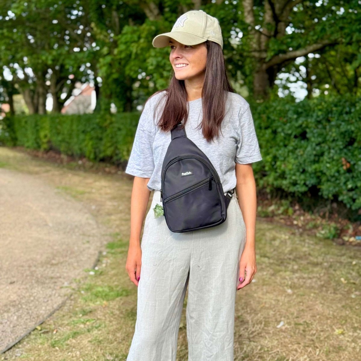 Dog Walking Sling Backpack – Black | Water Resistant | PupClub Couture