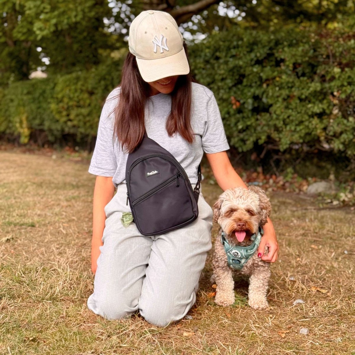 Dog Walking Sling Backpack – Black | Water Resistant | PupClub Couture